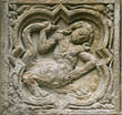 Panel 17:02 - Basilisk-type hybrid with the upper body of a long-haired man
